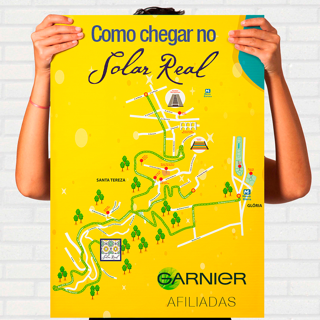 Mapa ilustrado de Santa Teresa e Glória no Rio de Janeiro, com fundo amarelo vibrante, árvores verdes e ícones de pontos turísticos, criado por Anderson Barros para Garnier e Agência Fluxxo.